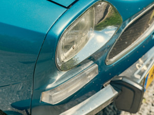 Citroen Ami 8 detail of front side with headlight, indicator light, bumper and grille